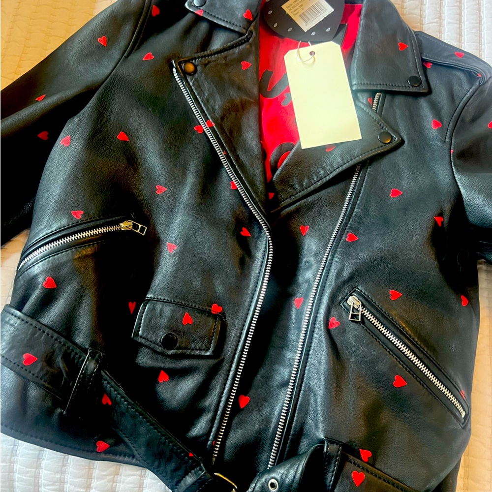 Black leather jacket, soft pebble,
leather size large with small hearts